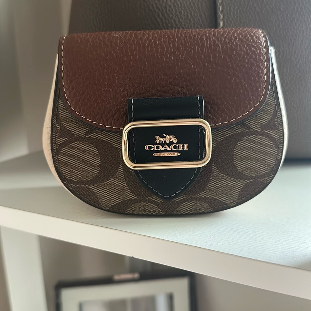 Coach Morgan card case on a chain